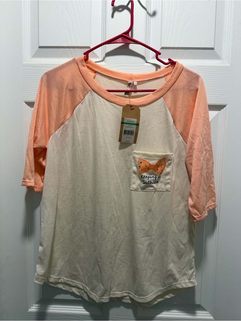 Cream & Peach Raglan Pocket Tee with Bow Graphic